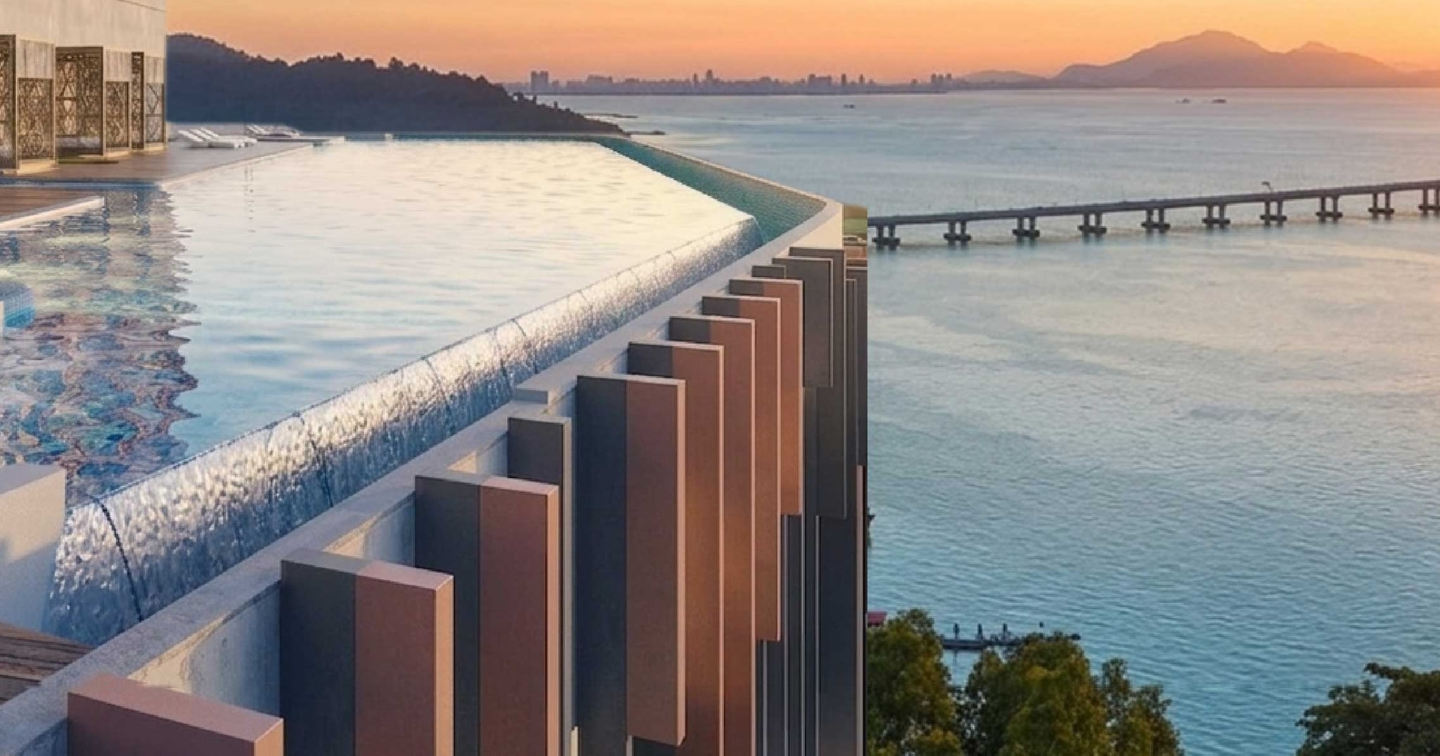 Level 8 podium deck showing the jacuzzi and the edge of the infinity pool at dusk